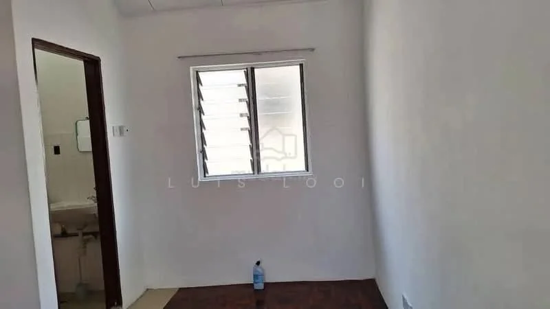 Room features: white painted walls, vinyl flooring, window with horizontal slats, door leading to bathroom, water bottle on floor.