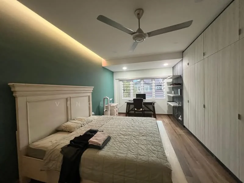 Bedroom features: king-size bed with upholstered headboard, bedding in neutral tones, wooden flooring, built-in wardrobe with sliding doors, desk with chair, ceiling fan, recessed LED lighting, green accent wall, large window with view, decorative wall paneling; style: modern; view: garden.