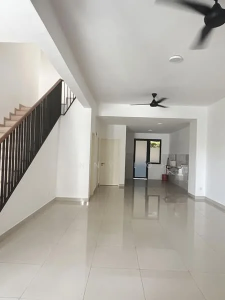 Room features: white painted walls, polished ceramic tile flooring, 2 ceiling fans, staircase with wooden steps and metal railing, open layout, doorway leading to another room, large windows for natural light, kitchen area visible in the background; style: modern.