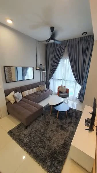 Living features: 3-seater fabric sofa in brown, coffee table with round top and wooden legs, area rug with plush texture, floor-to-ceiling windows, sheer curtains, 5-blade ceiling fan with light, wall-mounted TV, decorative mirror, shelf with decorative items; style: modern.