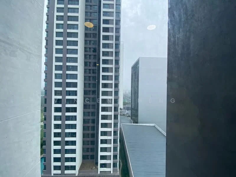 Exterior type: high-rise condominium; features: glass curtain wall, concrete facade, recessed balconies, surrounded by urban landscape, adjacent buildings visible, multiple storeys, modern architectural design; style: modern.