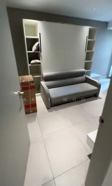 Room features: grey fabric sofa, built-in shelving unit, white wall, light-colored floor tiles, decorative pillows on shelves, box on floor; style: modern.