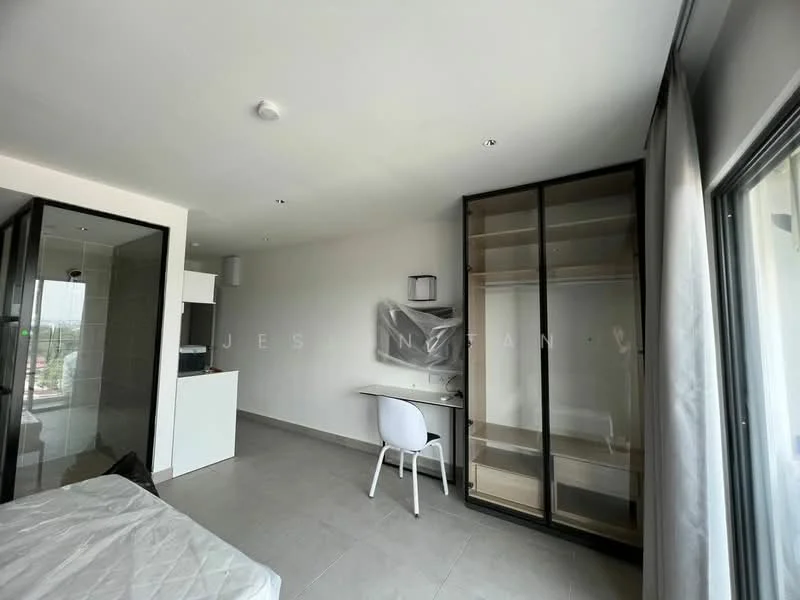 Room features: white painted walls, grey tiled flooring, large glass windows, built-in wardrobe with glass doors, study desk with white chair, recessed ceiling lights, curtains, minimalist decor; style: modern; view: city.