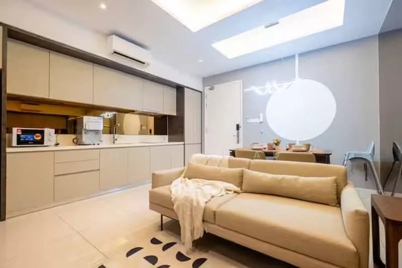 Living features: beige fabric sofa, coffee table, dining table with chairs, microwave, built-in cabinetry, recessed ceiling lights, skylight, white walls, tile flooring, decorative wall art, area rug with geometric pattern, dining area, wall-mounted air conditioning unit; style: modern.