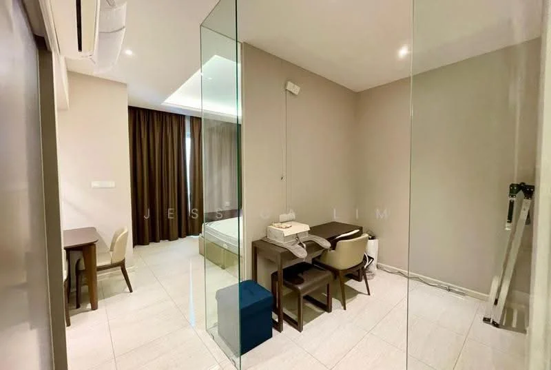 Room features: light-colored walls, tile flooring, ceiling with recessed lighting, floor-to-ceiling glass partition, window with sheer curtains, air conditioning unit, wooden desk, upholstered chair, bed frame without mattress, small blue storage box; style: modern.