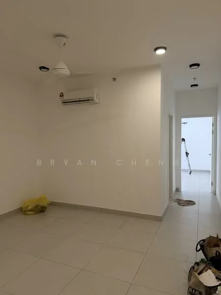 Room features: white painted walls, ceiling with recessed downlights, 5-blade ceiling fan, wall-mounted split AC, light grey floor tiles, doorway leading to another room, vacuum cleaner visible, yellow plastic bag on floor, paint roller leaning against wall; style: modern.