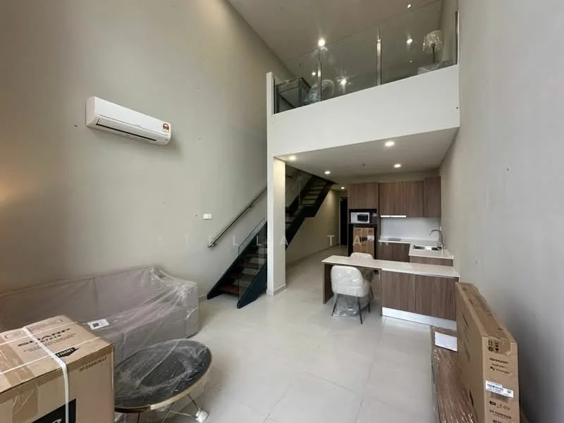 Living features: grey painted walls, white ceiling, 1 wall-mounted split AC, floor-to-ceiling windows, light-colored tile flooring, sofa wrapped in plastic, coffee table, open kitchen layout, kitchen island, microwave, built-in cabinets, staircase with metal railing; style: modern.