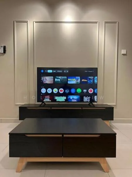Living features: flat-screen TV, black TV console, wooden coffee table with drawers, light-colored wall, recessed lighting, neutral tile flooring, decorative wall paneling, remote control on wall; style: modern.