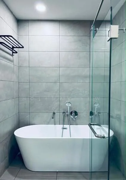 Bathroom features: freestanding bathtub, glass shower enclosure, chrome shower faucet, chrome bathtub faucet, grey tile cladding on walls, grey tile flooring, wall-mounted towel rack, recessed lighting; style: modern.