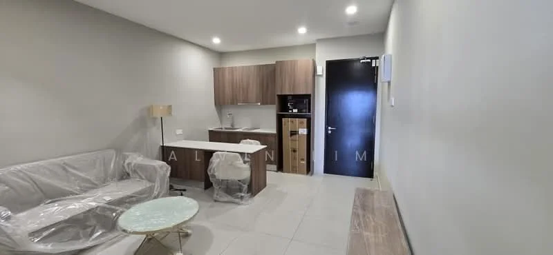 Living features: grey painted walls, tile flooring, sofa with protective covering, coffee table with glass top, kitchenette with wood cabinetry, stainless-steel sink, built-in fridge, countertop with bar seating, recessed downlights, black door, wall-mounted light fixture; style: modern.