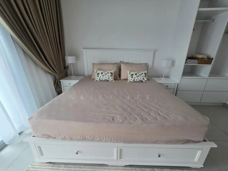 Bedroom features: king-size bed with upholstered headboard, bedding in beige, two bedside lamps, white nightstands, decorative pillows with floral pattern, floor-to-ceiling windows with sheer curtains, white painted walls, light-colored tile flooring, built-in wardrobe with open shelving; style: modern.