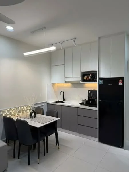 Kitchen features: white upper cabinets, grey lower cabinets, black refrigerator, built-in microwave, single-bowl stainless-steel sink, chrome pull-down faucet, white quartz countertop, tile backsplash, 4-burner gas hob, recessed LED downlights, dining table for four, black dining chairs, white tiled flooring, wall-mounted kitchen storage, decorative wall art; style: modern.