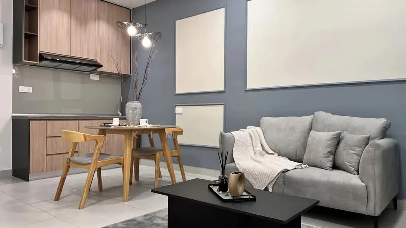Living features: grey fabric sofa, wooden coffee table, 2 wooden dining chairs, dining table, pendant light fixture, decorative vase, wall-mounted decor panels, light grey area rug, white walls, grey accent wall, ceramic tile flooring; style: modern.