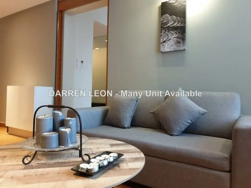Living features: grey fabric sofa, round wooden coffee table, decorative candles, wall art with abstract design, light grey painted walls, wooden flooring, recessed lighting, open layout; style: modern.