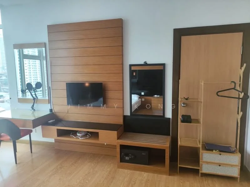 Room features: wood panel accent wall, wall-mounted TV, floating TV console, built-in storage cabinet, desk with mirror, chair, wooden flooring, clothes rack, small storage basket; style: modern; view: city.