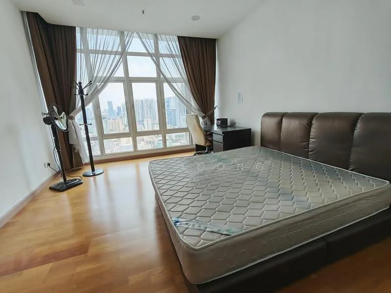 Bedroom features: king-size bed, brown leather headboard, floor-to-ceiling windows, city skyline view, wooden flooring, brown curtains, desk with chair, standing fan; style: modern; view: city.
