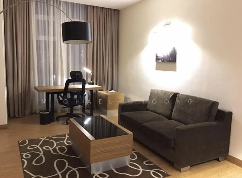 Living features: brown fabric sofa, wood coffee table with glass top, area rug with geometric pattern, wood desk, black office chair, table lamp, curtains, wood flooring, wall-mounted artwork, recessed lighting; style: modern.