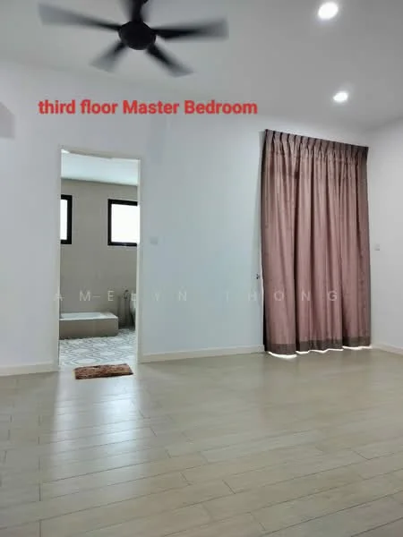 Bedroom features: wooden flooring, white painted walls, 5-blade ceiling fan, large window with natural light, curtains in dark brown, doorway leading to bathroom, neutral color palette, minimalist decor; style: modern.