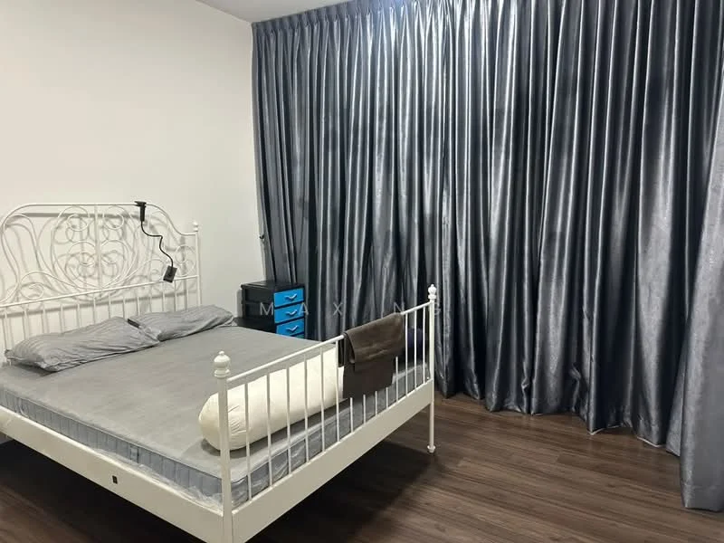 Bedroom features: metal bed frame with headboard, queen-size bed, grey bedding, dark wood flooring, floor-to-ceiling grey curtains, nightstand with drawers, decorative throw pillow, wall-mounted light fixture; style: modern.