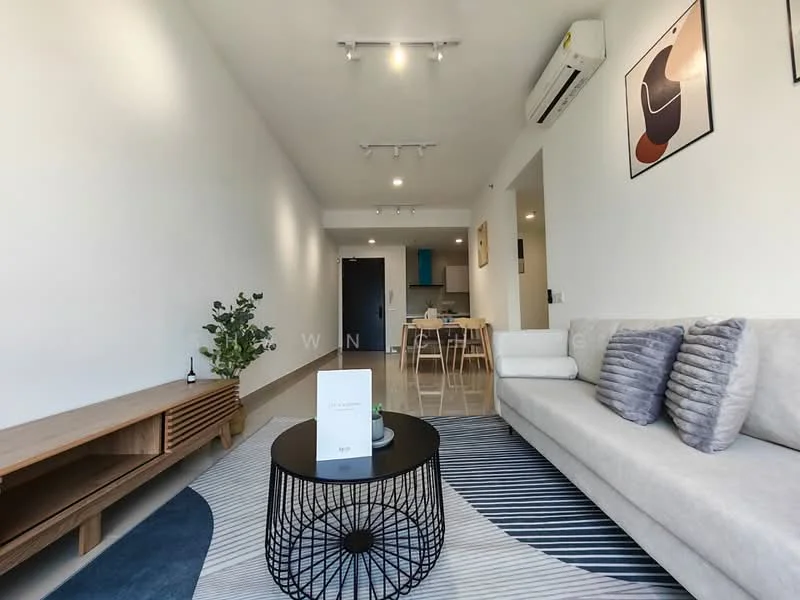 Living features: light grey fabric sofa, decorative cushions, black round coffee table with geometric design, wooden TV console, wall-mounted air conditioning unit, recessed ceiling lights, cream painted walls, polished tile flooring, area rug with blue and white pattern, framed artwork on walls, indoor plant; style: modern.
