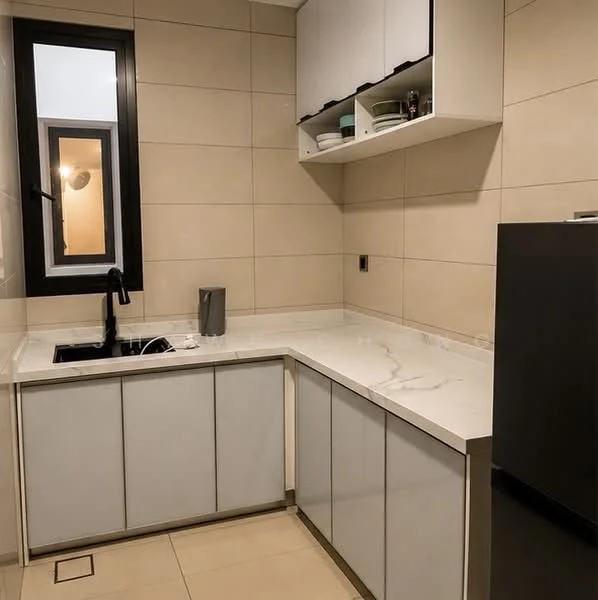 Kitchen features: white quartz countertop, grey flat-panel cabinets, stainless-steel sink, black pull-down faucet, built-in refrigerator, wall-mounted shelves, cream tiled walls, tile flooring, window with black frame; style: modern.