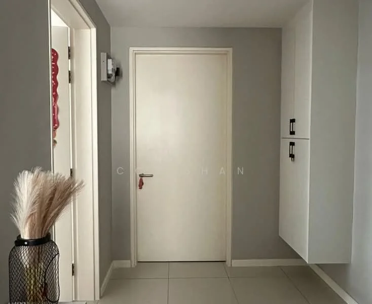 Room features: grey painted walls, white cabinetry, white door, tile flooring, decorative vase with dried plants, wall-mounted intercom, light switch, door handle; style: modern.