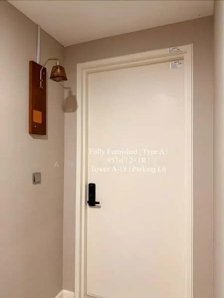 Room features: white painted walls, light beige accent wall, wooden door with black handle, bell fixture on wall, light fixture on wall, electrical switch, doorbell, door number plate; style: modern.
