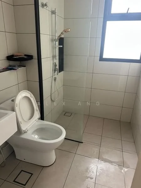 Bathroom features: white ceramic toilet, glass shower enclosure, chrome shower head, wall-mounted shower faucet, white wall tiles, grey floor tiles, window for natural light, shelf for toiletries; style: modern.
