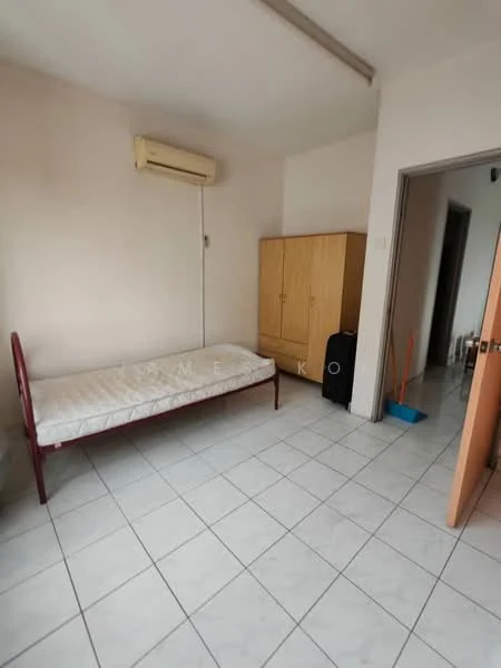 Bedroom features: single bed frame with mattress, cream painted walls, white tiled flooring, 1 wall-mounted split AC, wooden wardrobe, black suitcase, broom, door leading to hallway.