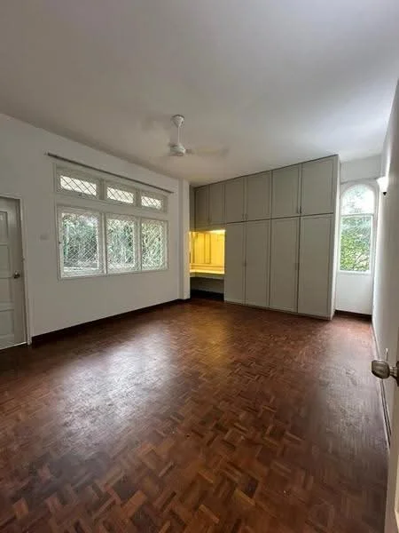 Room features: parquet wood flooring, white painted walls, ceiling fan, large windows with grille, built-in cabinetry, natural light from windows, corner window, door leading to hallway; style: modern; view: garden.