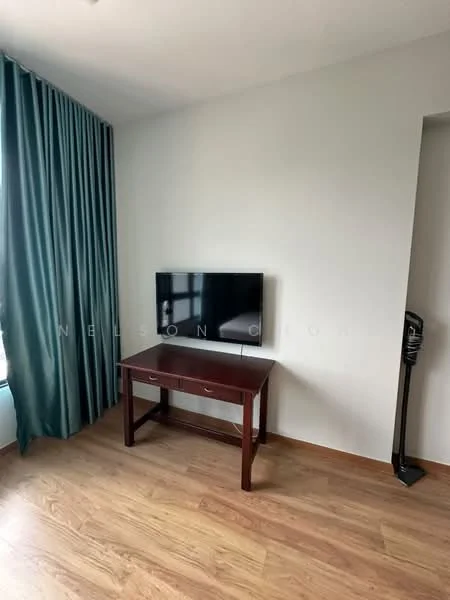 Room features: light wood laminate flooring, white painted walls, floor-to-ceiling window with city view, curtains in teal fabric, wall-mounted flat-screen TV, wooden desk with two drawers, black standing vacuum cleaner; style: modern; view: city.