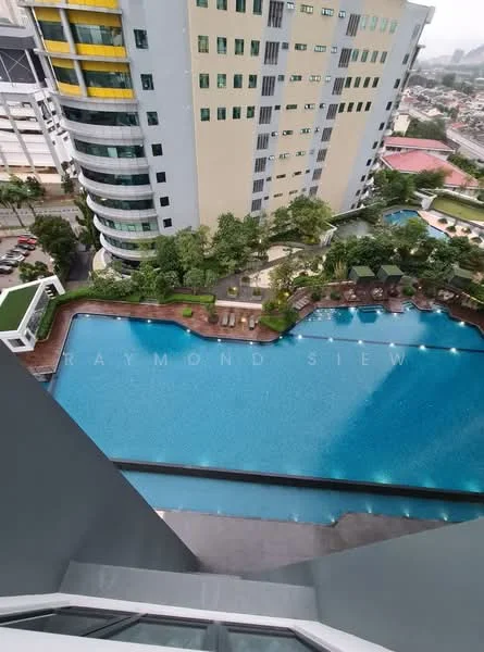 Exterior type: high-rise condominium; features: infinity pool, pool deck with loungers, landscaped garden area, surrounded by greenery, multiple levels of the building, balconies visible on the building, city skyline in background; style: modern.