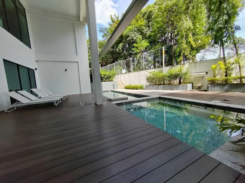 Exterior type: swimming pool deck; features: infinity pool, wooden deck flooring, sun loungers, surrounding greenery, concrete wall, landscaped garden, outdoor lighting, fenced perimeter; style: modern.
