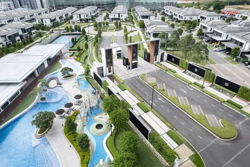 Exterior type: gated community; features: infinity pool, children's splash pool, landscaped gardens, manicured lawns, palm trees, outdoor seating areas, driveway with interlocking pavers, guard house at entrance, double-volume main lobby, feature water wall, surrounded by mature greenery, modern architectural design; style: modern.