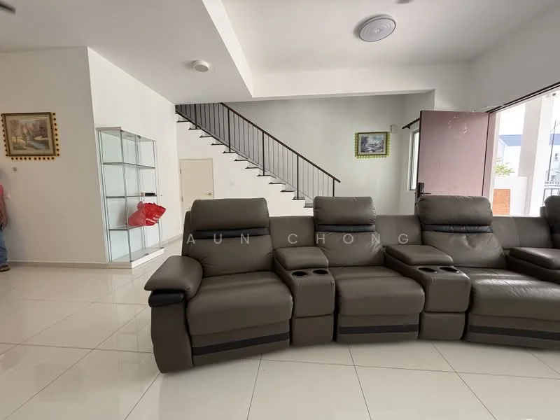 Living features: L-shape sectional leather sofa in dark grey, recliner seats, white painted walls, white tiled flooring, large windows with natural light, ceiling light fixture, staircase with metal railing visible in background, decorative artwork on wall, glass display cabinet, open layout; style: modern.