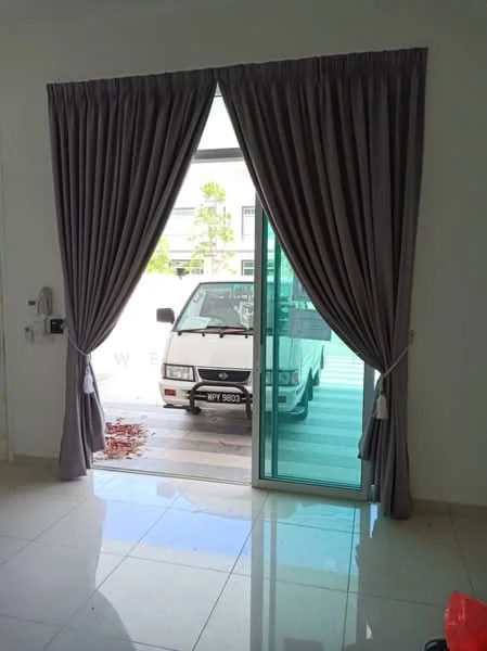 Room features: floor-to-ceiling sliding glass door, grey curtains, white walls, glossy tile flooring, natural light from door, visible vehicle outside.