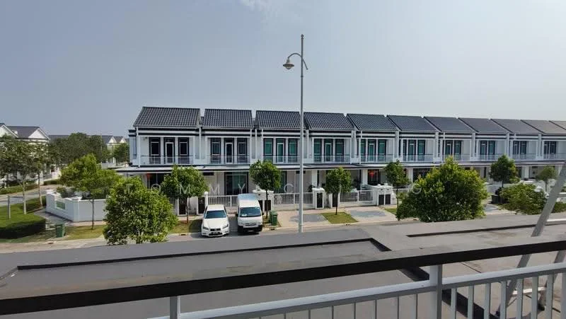 Exterior type: linked terrace house; features: solar panels on roof, two-storey building, manicured landscaping, trees in front yard, driveway with parked vehicles, street view with road, modern facade with large windows, balconies on upper level; style: modern.