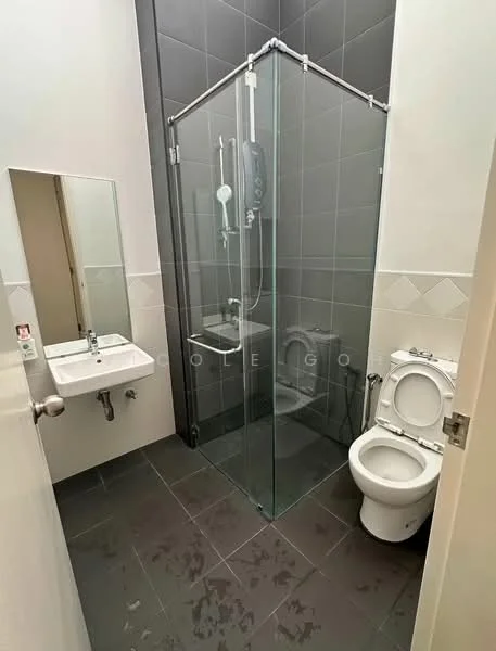 Bathroom features: glass shower enclosure, rain shower head, handheld shower, wall-mounted shower controls, white sink with chrome faucet, mirror above sink, white toilet, grey tiled walls, dark grey tiled flooring, chrome towel rail; style: modern.