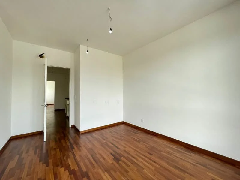 Room features: white painted walls, wooden flooring, two pendant lights, single door, door frame, baseboards.