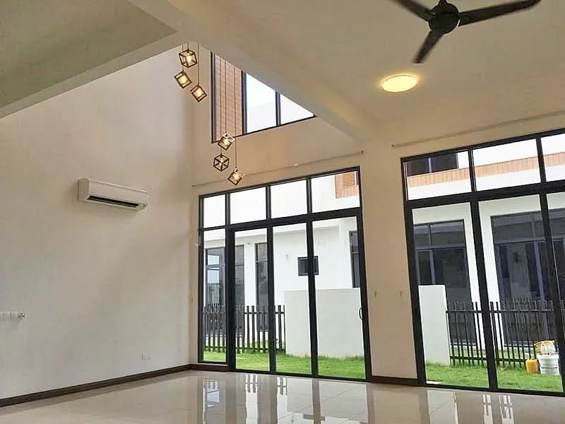 Living features: high ceiling, large floor-to-ceiling windows, sliding glass doors, white painted walls, polished tile flooring, 5-blade ceiling fan, modern pendant lighting, air conditioning unit, view of outdoor grass area, black window frames, open layout; style: modern; view: garden.