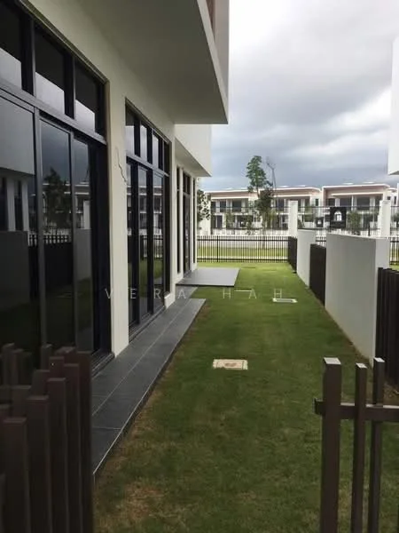 Exterior type: linked terrace house; features: glass sliding doors, white painted facade, manicured lawn, stone-paved walkway, fence with vertical slats, two-storey structure, surrounded by greenery, modern architectural design; style: modern.