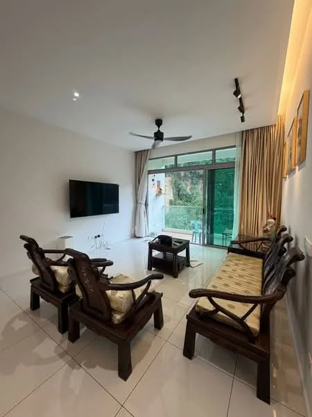 Living features: white painted walls, glossy white tile flooring, 5-blade ceiling fan with light, wall-mounted TV, large sliding glass door, floor-to-ceiling windows, sheer curtains, wooden coffee table, two wooden armchairs, sofa with beige upholstery, decorative cushions; style: modern; view: garden.