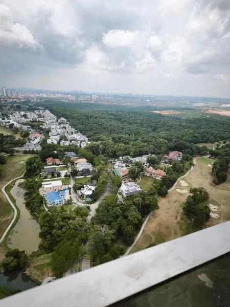 Exterior features: aerial view of residential area, lush greenery, golf course visible, water bodies, various styles of houses, manicured lawns, surrounding hills, urban skyline in the distance; style: contemporary.