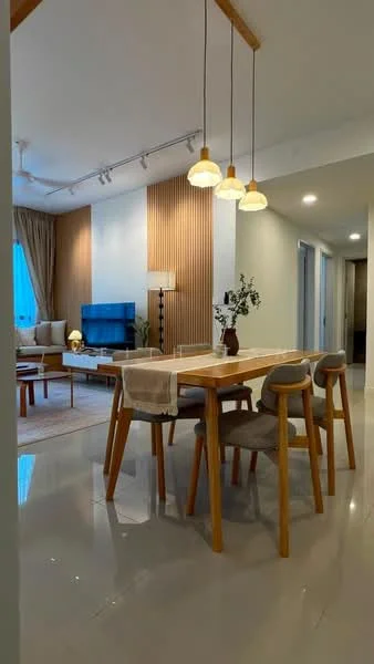 Dining features: wooden dining table, 4 upholstered dining chairs, pendant lighting with three bulbs, white table runner, decorative vase with flowers, light grey walls, glossy tile flooring, large window with sheer curtains, wooden accent wall, wall-mounted TV, sofa in the background, area rug; style: modern. Living features: sofa, coffee table, floor lamp, wall-mounted TV, wooden accent wall, large window with sheer curtains, decorative plants; style: modern. Hallway features: light grey walls, glossy tile flooring, recessed lighting, doorways leading to other rooms.