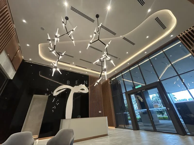 Room features: modern reception desk, chandelier with multiple light sources, black accent wall, wood paneling, recessed lighting, large glass entrance doors, floor-to-ceiling windows, marble flooring; style: modern; view: garden.