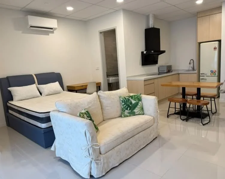 Living features: sofa with decorative cushions, double bed with mattress, wooden dining table with 4 chairs, kitchenette with countertop, built-in kitchen cabinets, stainless-steel fridge, built-in oven, stainless-steel range hood, single-bowl stainless-steel sink, wall-mounted split AC, white painted walls, glossy tile flooring, recessed ceiling lights; style: modern.