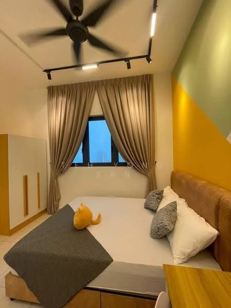 Bedroom features: queen-size bed, upholstered headboard, grey throw blanket, two decorative pillows, floor-to-ceiling window, sheer curtains, recessed LED downlights, 5-blade ceiling fan, wooden bedside table, built-in wardrobe with white finish, accent wall in yellow and green, tile flooring; style: modern.