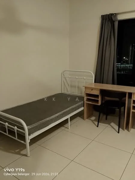 Bedroom features: single bed frame with mattress, wooden study desk with drawers, grey curtains, floor-to-ceiling window, tile flooring, plain white walls, nightstand, city view; style: minimalist; view: city.