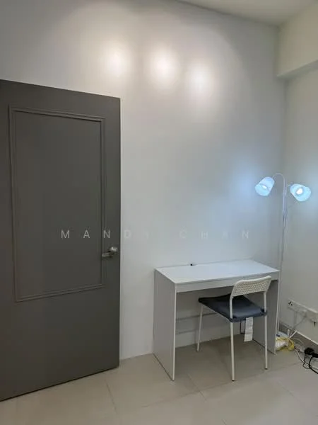 Room features: grey door, white walls, tile flooring, desk with white surface, white chair, blue floor lamp, recessed lighting; style: minimalist.