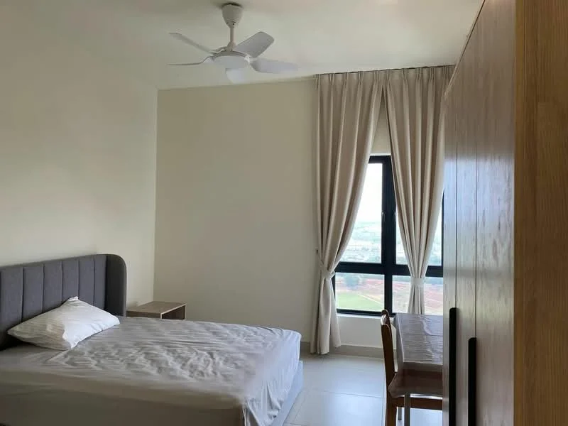 Bedroom features: queen-size bed with grey upholstered headboard, white bedding, wooden bedside table, wooden study desk, chair, floor-to-ceiling window, sheer curtains, ceiling fan, light-colored walls, tile flooring; style: modern; view: city.